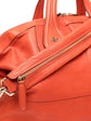 Givenchy Nightingale handbag with structured design and leather finish, featuring gold-tone hardware and top handles.