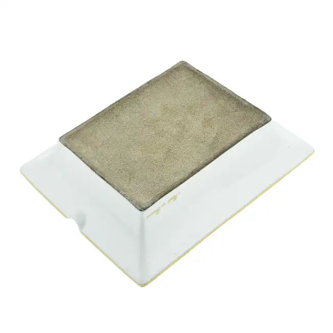 Hermès Butterfly Ashtray, elegant ceramic object featuring a butterfly design, showcasing fine craftsmanship and stylish decor.