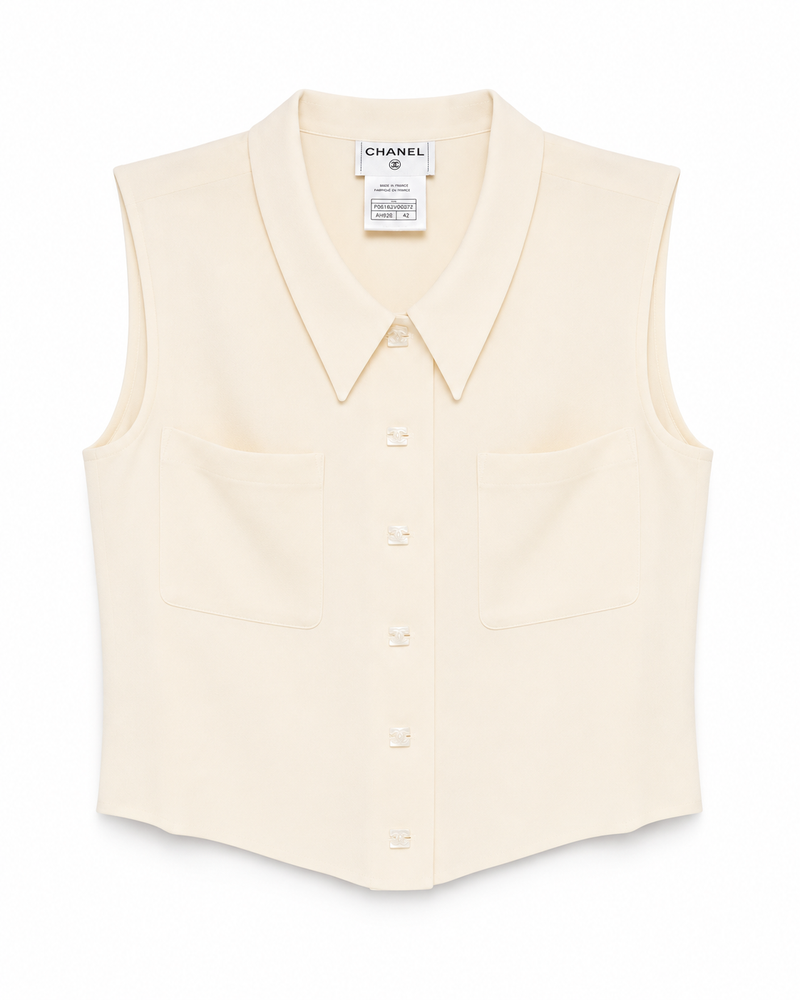 Chanel cropped collared sleeveless vest, stylish tops with button-up front and tailored fit, ideal for layered fashion looks.