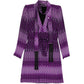 Gucci abstract print dress showcasing a colorful, artistic design with flowing fabric and elegant silhouette.