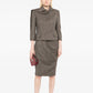 Alexander McQueen 2005 tailored wool skirt suit set featuring a structured blazer and matching skirt for a sophisticated look.