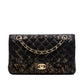 Chanel medium quilted chevre leather shoulder bag with lace detailing, gold hardware, classic double flap design in black.