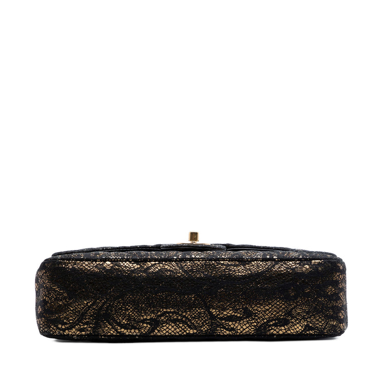 Chanel medium quilted chevre leather shoulder bag with lace detailing, gold hardware, classic double flap design in black.