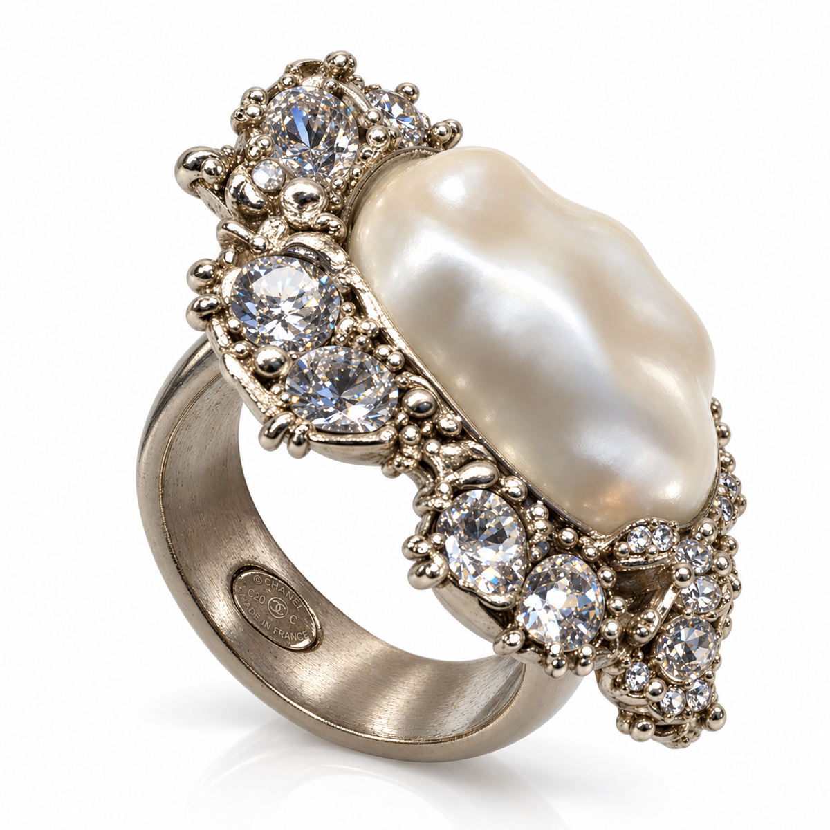 White Chanel CC ring with rhinestones, featuring a baroque pearl design, elegant cocktail ring for sophisticated style.