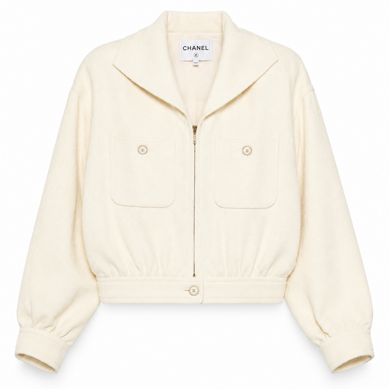 Beige Chanel cream tweed front zip blazer jacket with tailored fit and classic collar, stylish for sophisticated look.