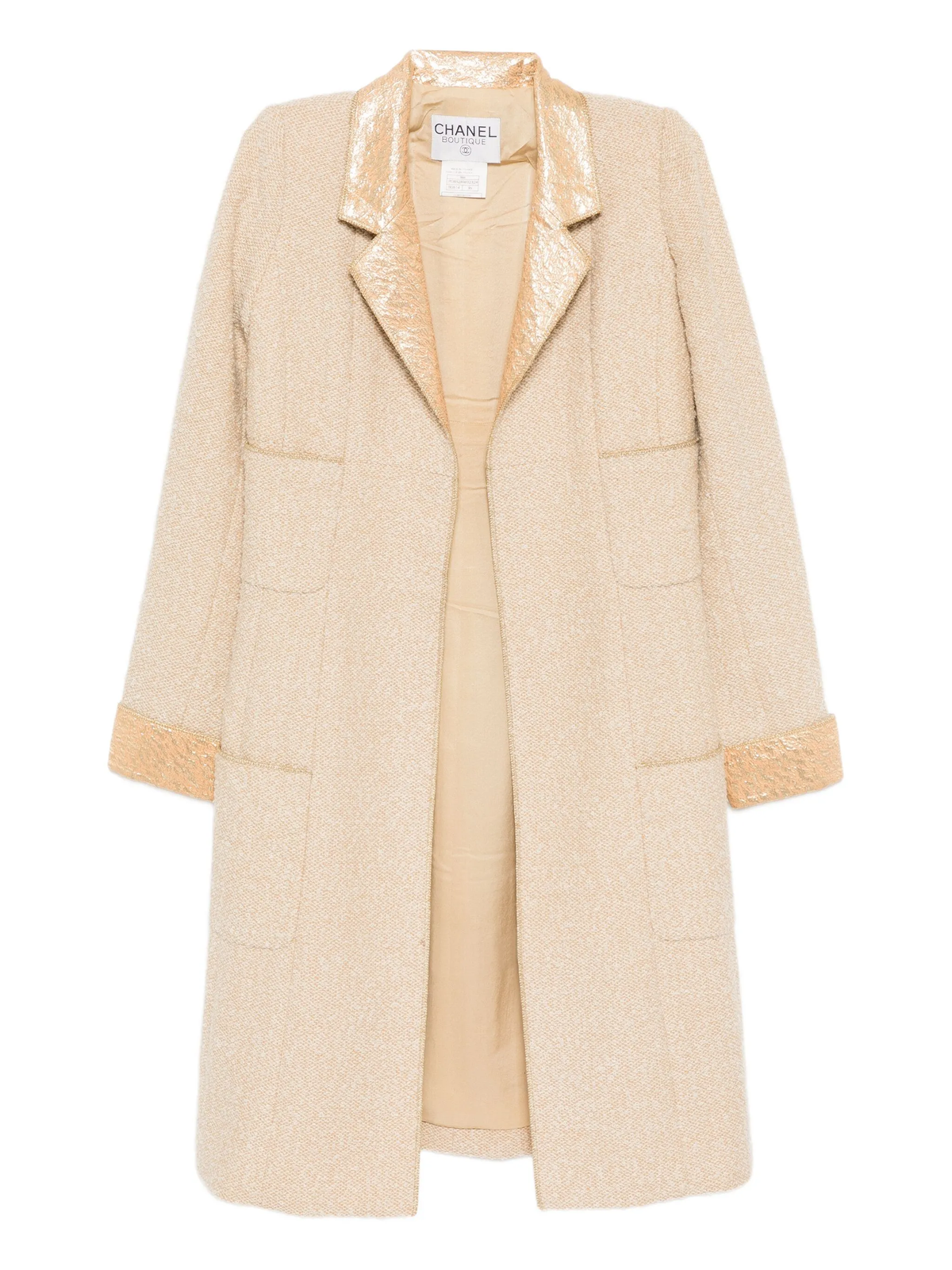 Beige wool bouclé Chanel coat with golden lamé accents, stylish and luxurious, shown on a hanger.
