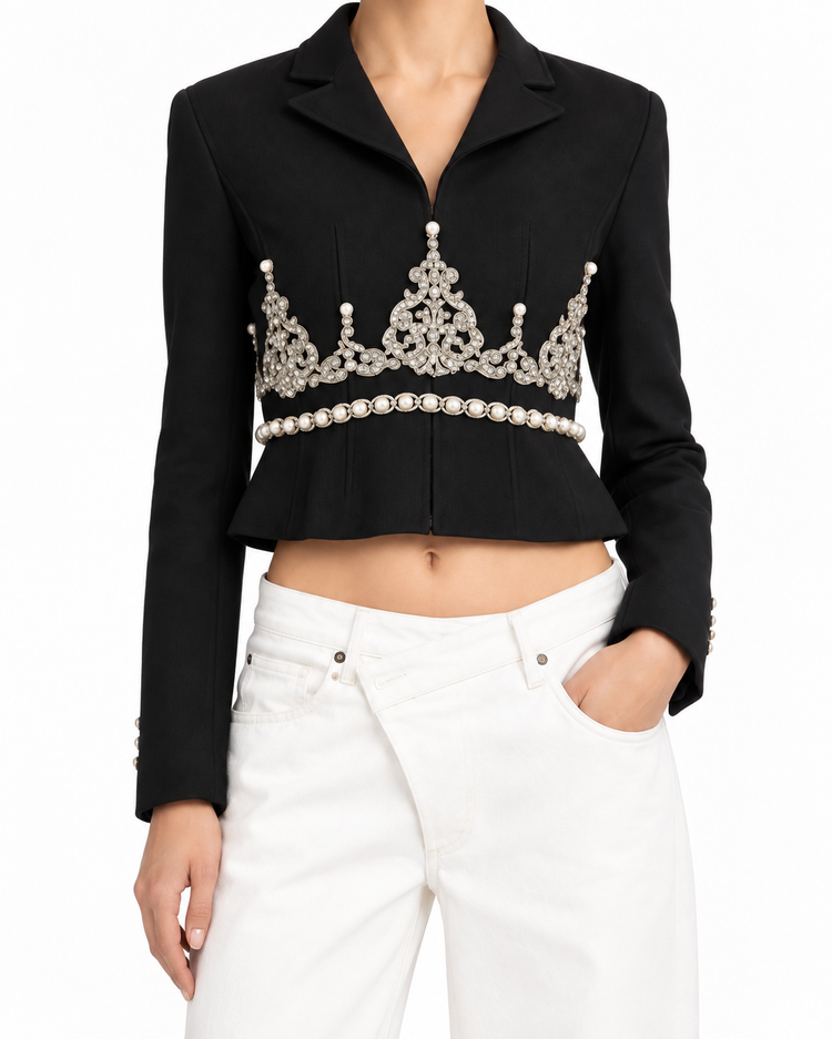 Black Chanel blazer with rhinestone embellishments, tailored fit, and elegant lapel, perfect for stylish formal occasions.
