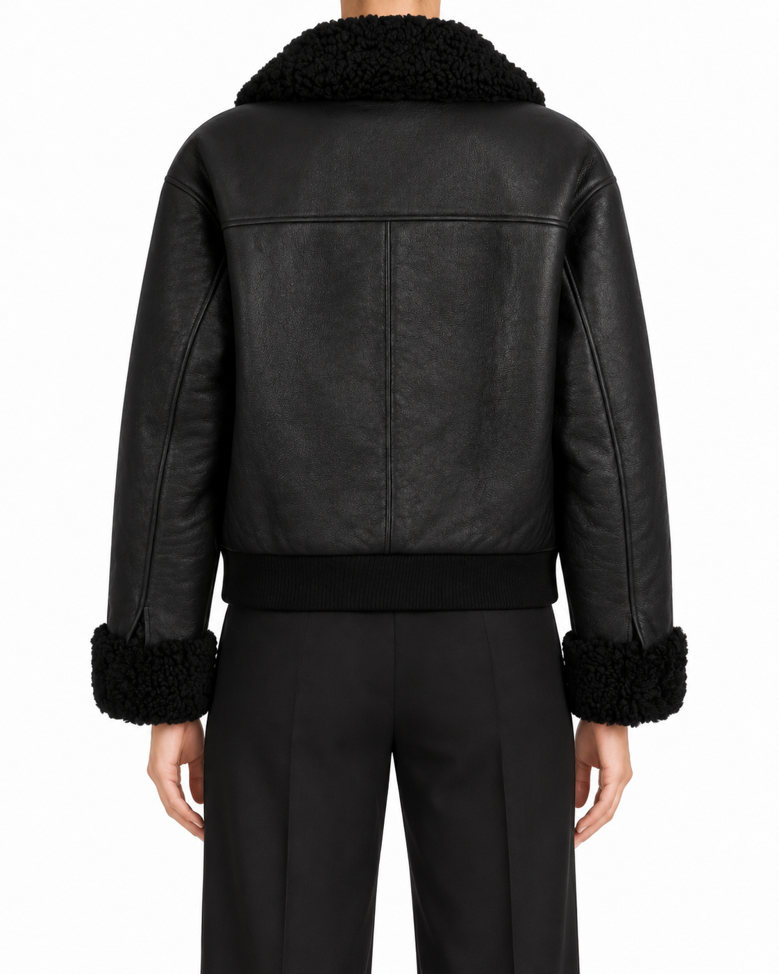 Black Chanel leather shearling jacket, stylish blazer with a plush shearling collar and sleek leather finish.
