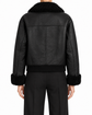 Black Chanel leather shearling jacket, stylish blazer with a plush shearling collar and sleek leather finish.