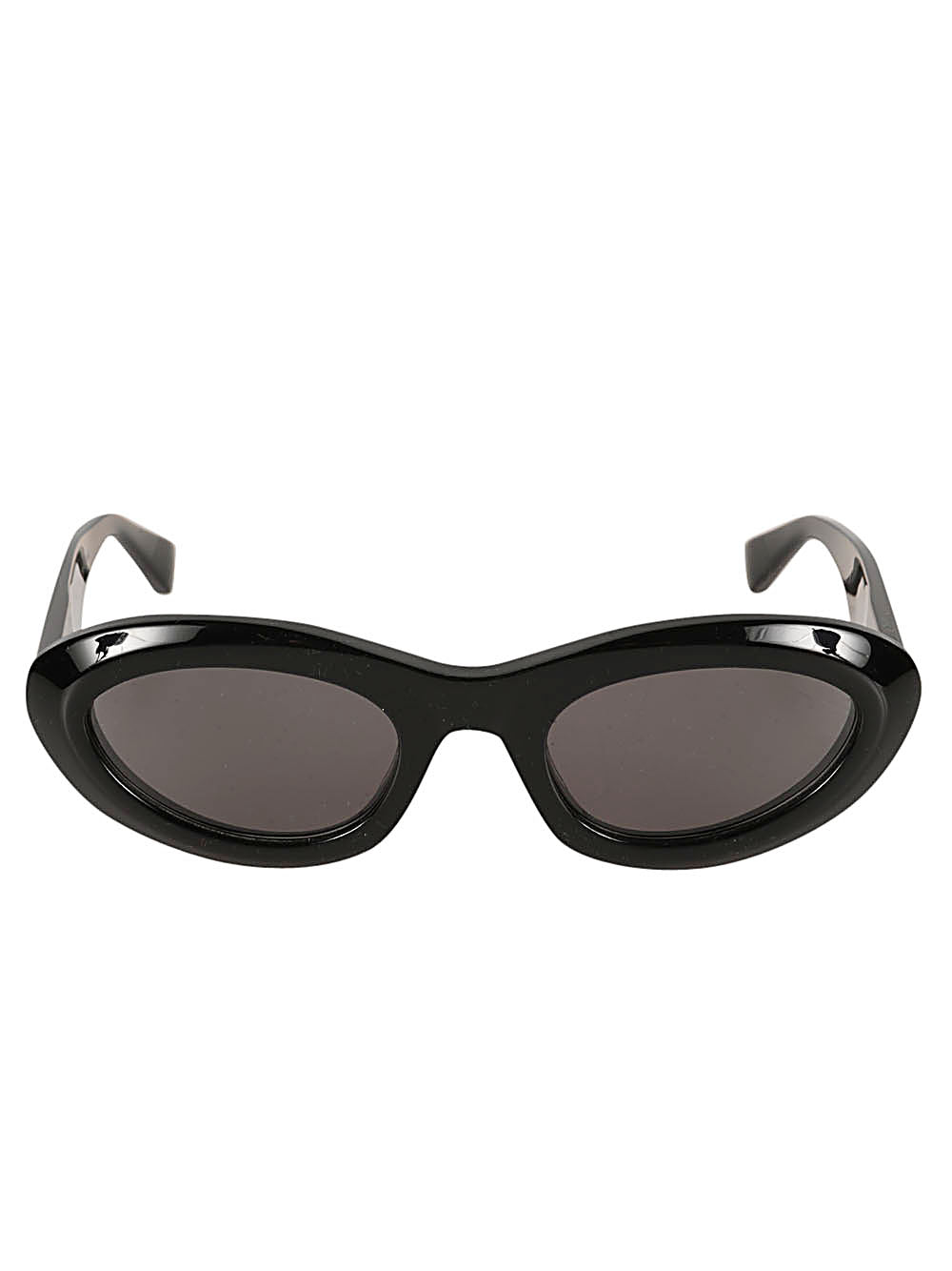 Bottega Veneta Almond Sunglasses in glossy black with narrow oval frames, dark tinted lenses and sculpted temples.