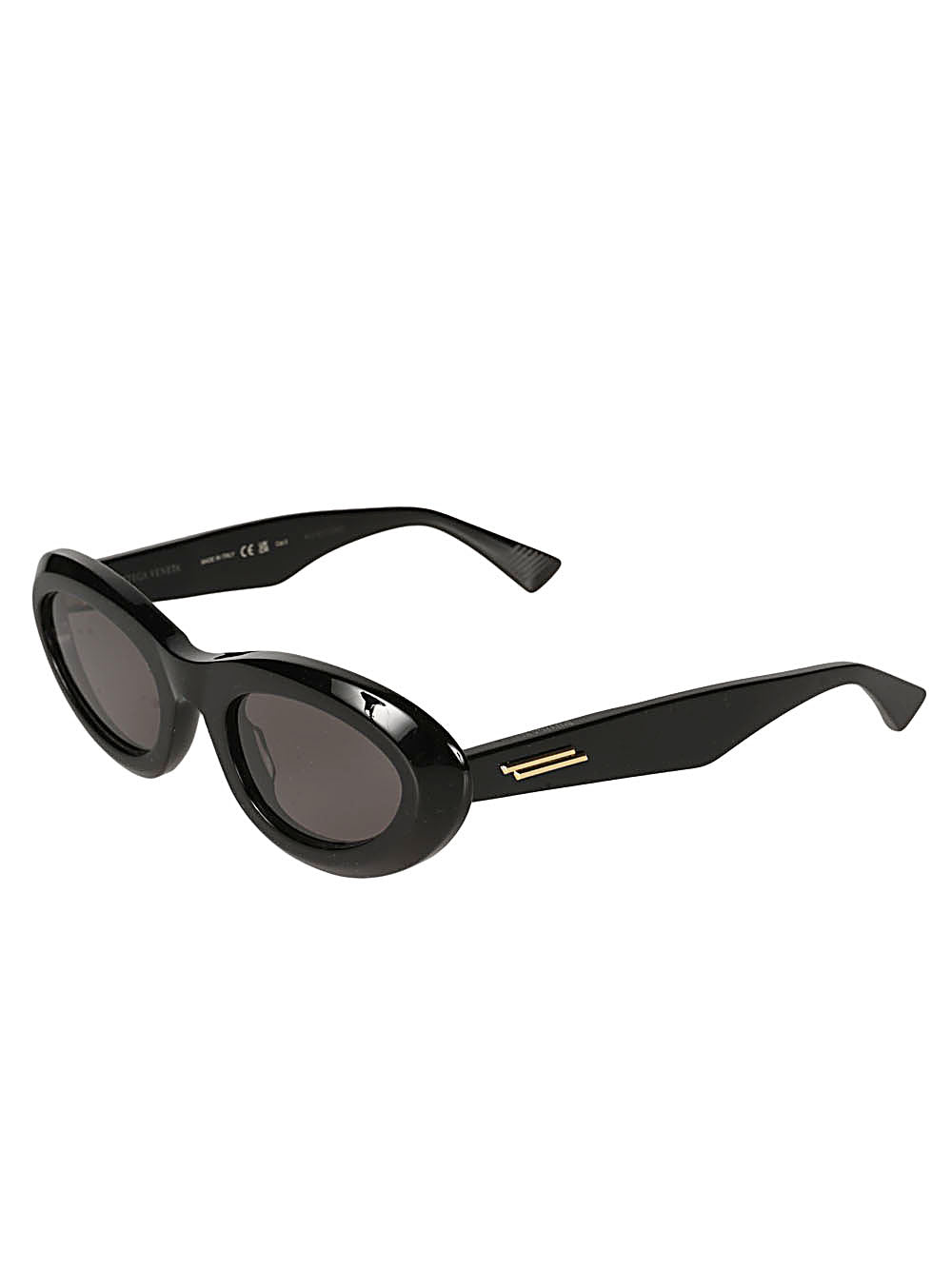 Bottega Veneta Almond Sunglasses in glossy black with narrow oval frames, dark tinted lenses and sculpted temples.
