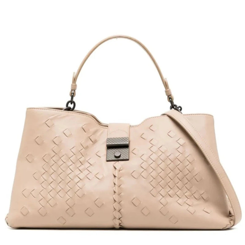 Bottega Veneta Intrecciato Roma Tote in beige leather with woven detailing, top handle, detachable shoulder strap and metal clasp fastening.