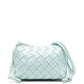 Bottega Veneta Mini Loop Intrecciato Candy Camera Bag in pale mint leather with signature woven construction, zip-top closure and knotted shoulder strap.