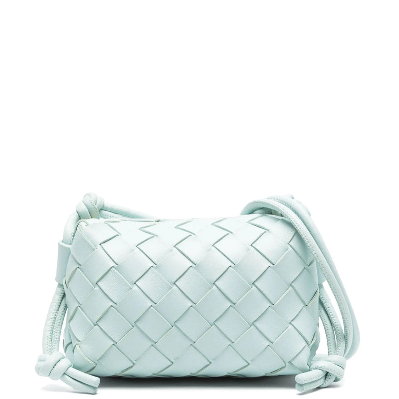 Bottega Veneta Mini Loop Intrecciato Candy Camera Bag in pale mint leather with signature woven construction, zip-top closure and knotted shoulder strap.