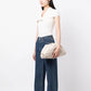 White Bottega Veneta leather clutch pouch with sleek design and subtle stitching details.