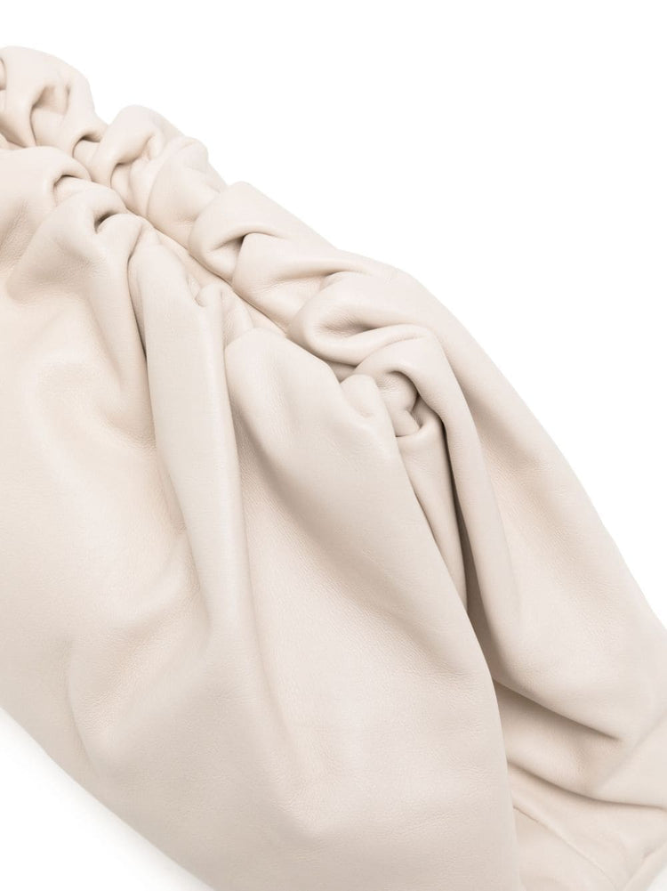 White leather clutch pouch by Bottega Veneta with sleek, minimalist design and subtle stitching details.