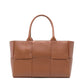 Bottega Veneta Small Arco Intrecciato Tote in camel leather with signature woven construction, structured silhouette and dual top handles.