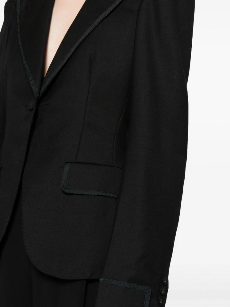 Bottega Veneta satin-trim single-breasted blazer featuring a tailored fit and sleek lapel design, displayed on a hanger.