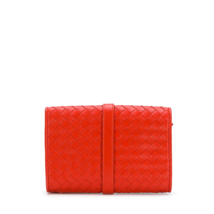 Red Bottega Veneta Intrecciato leather jewellery pouch for small accessories, featuring woven design and compact size.