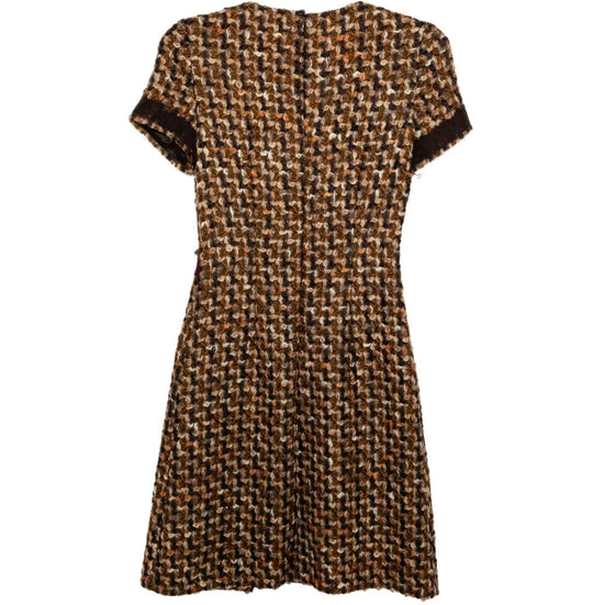 Prada brown tweed dress displayed on a mannequin, showcasing its tailored fit and classic textured fabric.
