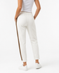 Brunello Cucinelli ivory jogger pants with elasticated drawstring waistband, brown side stripe panels, metallic trim detail, tapered leg, rolled cuffs, and relaxed tailored fit.