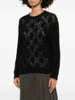 Black Brunello Cucinelli double layer jumper, close-up of stylish knit top with layered design and fine craftsmanship.