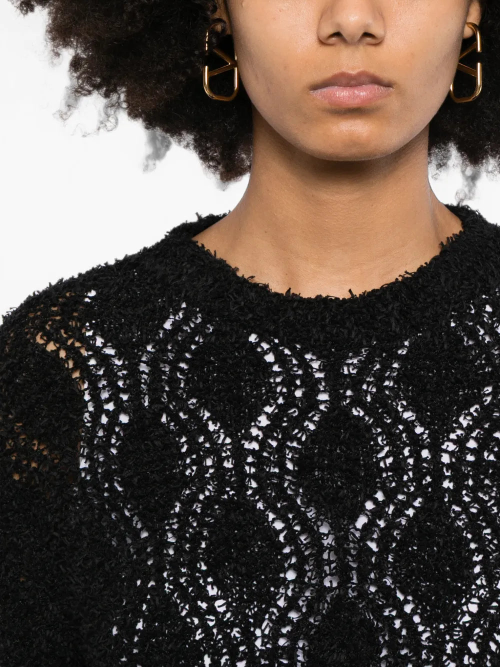 Black Brunello Cucinelli double layer jumper, showcasing the stylish layered top design and soft knit fabric.
