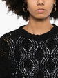 Black Brunello Cucinelli double layer jumper, showcasing the stylish layered top design and soft knit fabric.