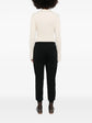 Back view of Brunello Cucinelli black jogger trousers, showcasing the relaxed fit and stylish waistband.