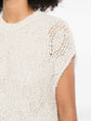 Brunello Cucinelli sleeveless knitted vest in soft beige, featuring a ribbed collar and fine knit texture, styled as a casual top.
