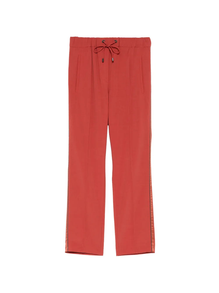 Front view of Brunello Cucinelli red drawstring trousers featuring a relaxed fit and adjustable waist for casual elegance.