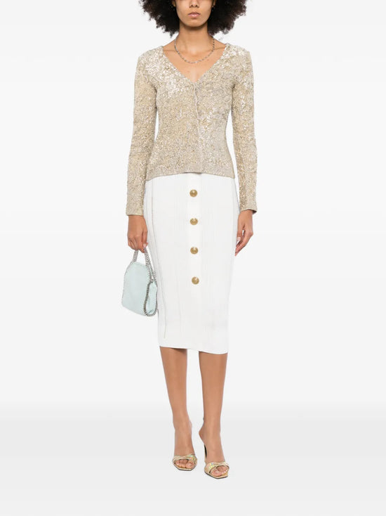 Gold sequin cardigan by Burberry Prorsum, featuring shiny sequins and a stylish knit top design.