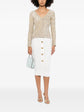 Gold sequin cardigan by Burberry Prorsum, featuring shiny sequins and a stylish knit top design.