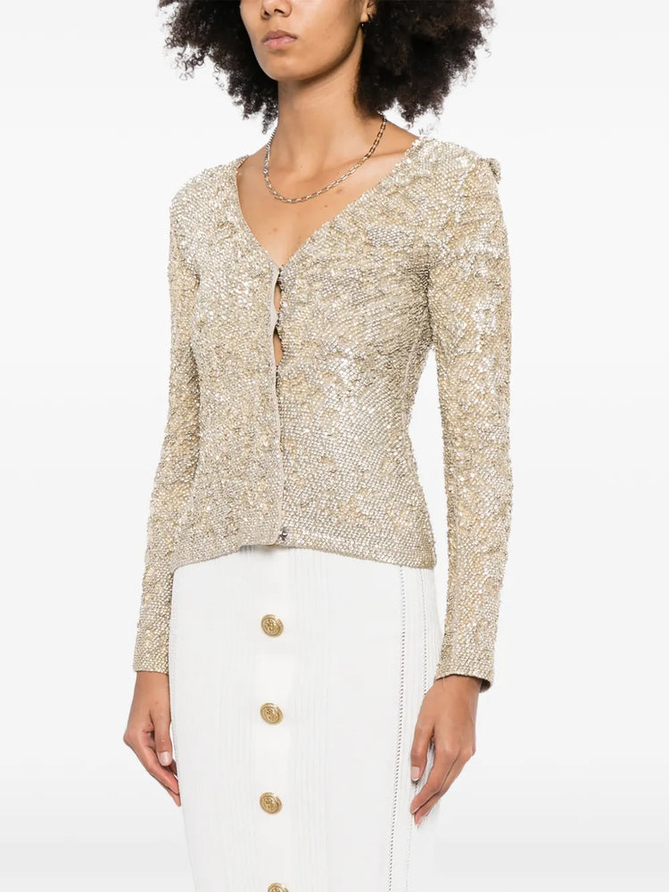 Gold sequin cardigan by Burberry Prorsum, stylish tops with shimmering sequins and a cozy fit.