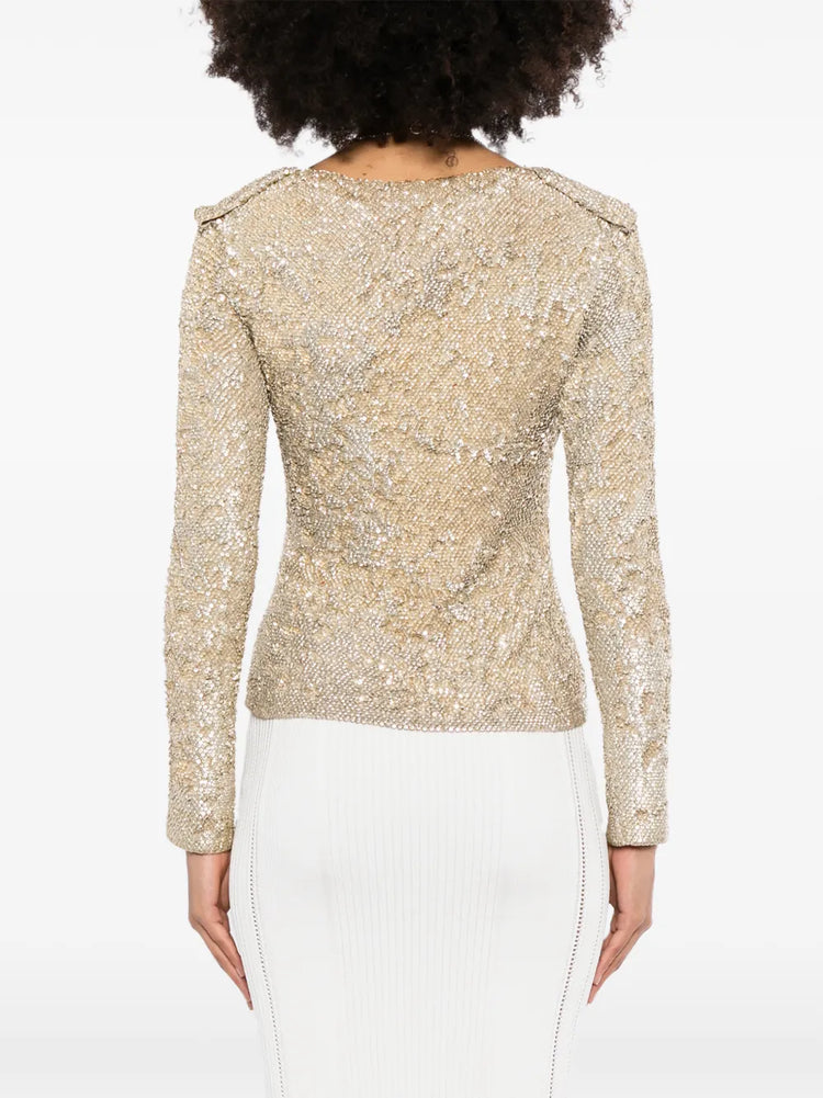 Back view of a gold sequin cardigan by Burberry Prorsum, stylish tops with shimmering sequins and a classic knit design.