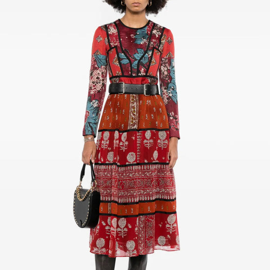 Burberry multi long sleeve dress featuring classic pattern and elegant design, showcased on a model.