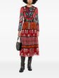Burberry multi long sleeve dress featuring classic pattern and elegant design, showcased on a model.
