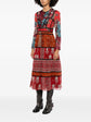 Burberry long-sleeve dress featuring a stylish, tailored design with classic pattern details, perfect for elegant occasions.
