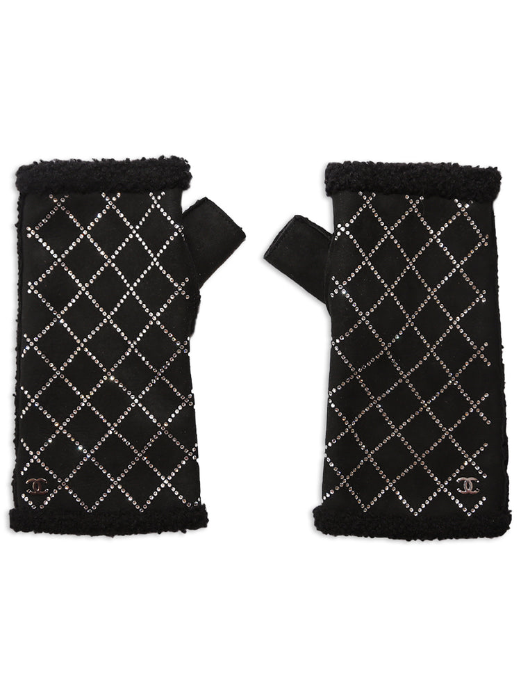 Chanel Black fingerless gloves with white diamond pattern on a white background