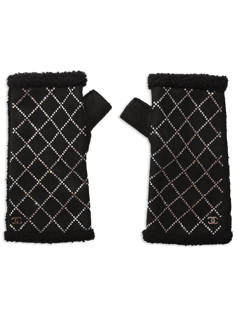 Chanel Black fingerless gloves with white diamond pattern on a white background