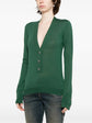 Pre-owned CHANEL green wool top featuring a classic design and tailored fit, perfect for stylish casual or semi-formal wear.