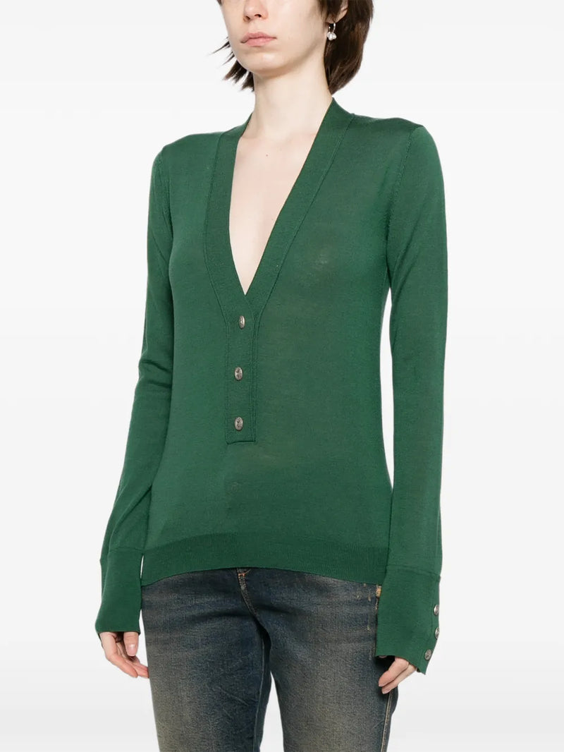 Pre-owned CHANEL green wool top featuring a classic design and tailored fit, perfect for stylish casual or semi-formal wear.