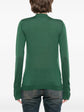 Pre-owned green wool top by CHANEL, stylish and cozy women&