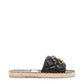 Pre-owned CHANEL quilted leather espadrilles with jute soles, stylish slip-on shoes for casual and chic summer wear.
