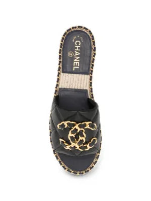 Pre-owned CHANEL quilted leather espadrilles with jute soles, stylish and comfortable slip-on shoes for casual wear.