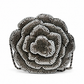 Chanel Camellia Minaudière evening clutch bag with floral design and elegant gold clasp on a black background.