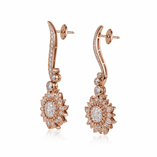 Carrera y Carrera Sol y Sombra diamond sun earrings with sparkling gold and diamond accents, featuring a sunburst design.