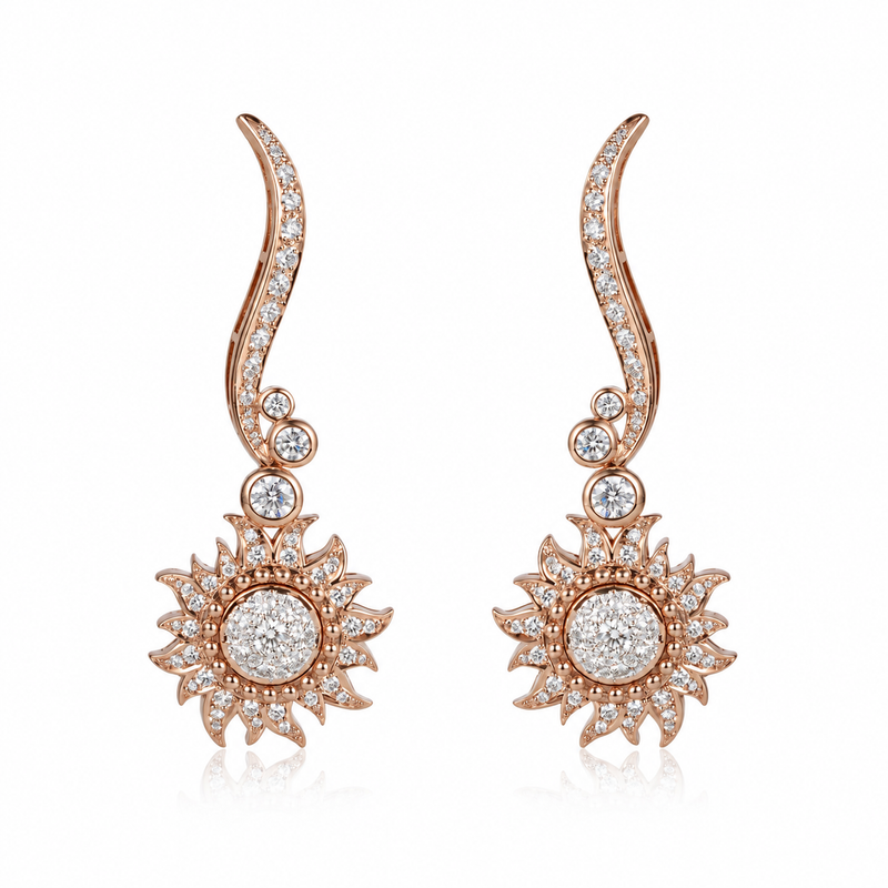 Carrera y Carrera Sol y Sombra diamond sun earrings with sparkling gold and diamond accents, featuring a sunburst design.