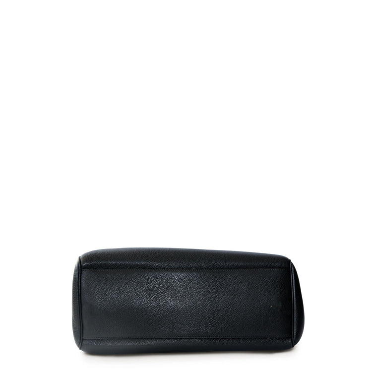 Black Celine Soft 16 tote shoulder bag with sleek design and spacious interior, perfect for everyday use.