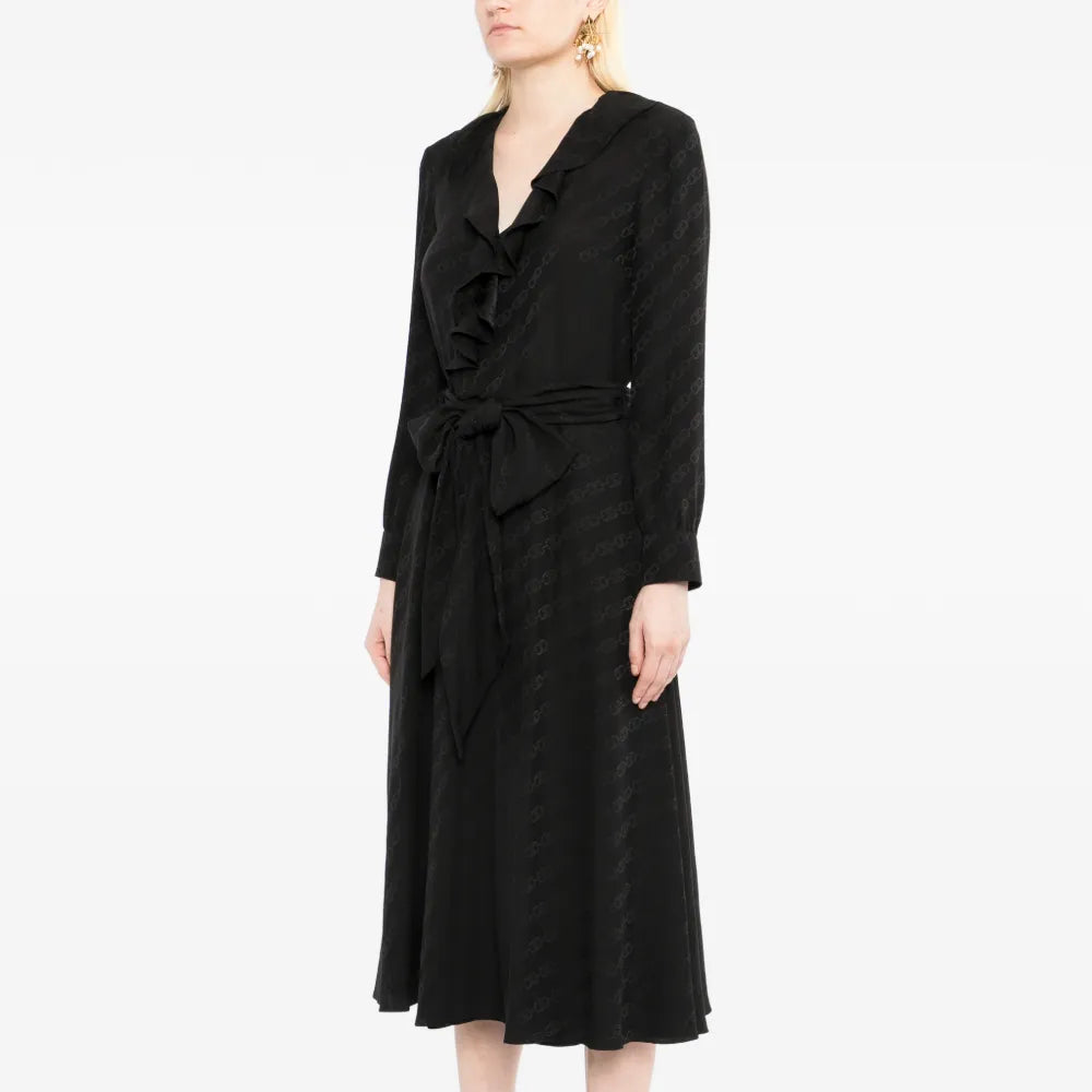 Celine black silk midi wrap dress with tonal Triomphe jacquard pattern, ruffled neckline, long sleeves and self-tie waist belt.